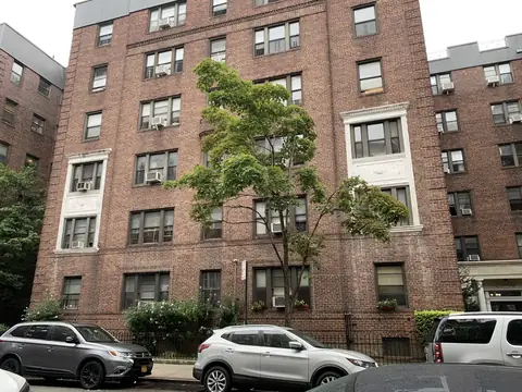 A brick apartment building on 74th Street in Jackson Heights, Queens